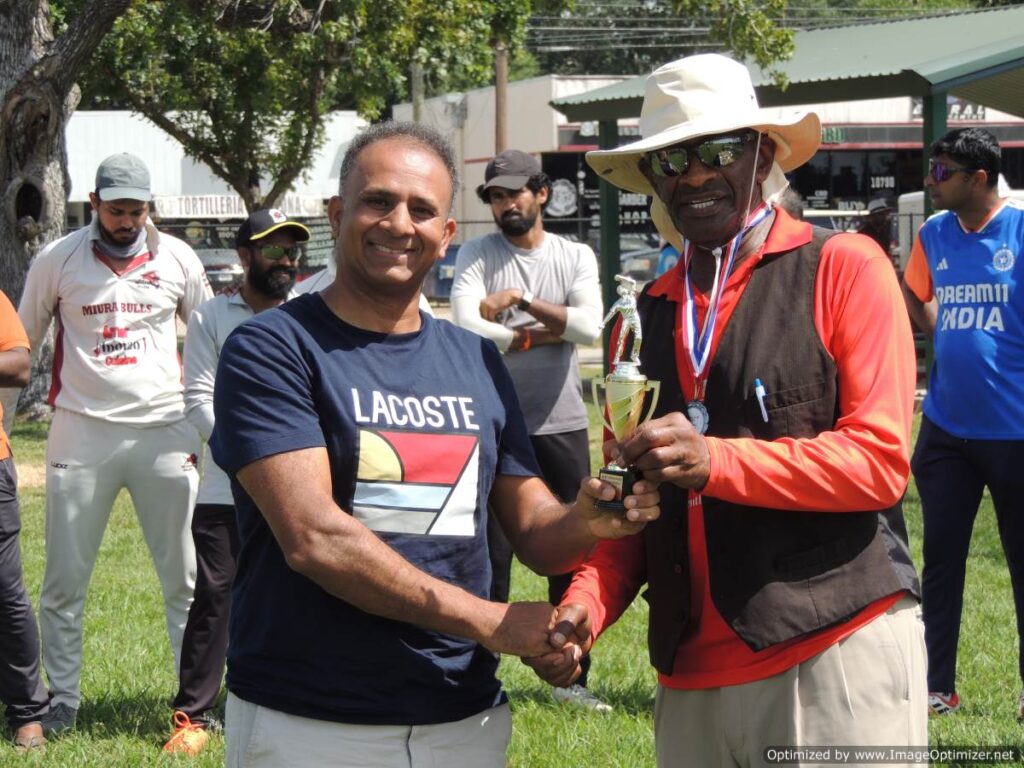 Rajneesh from CM Houston Arrows with the special trophy for Hat trick