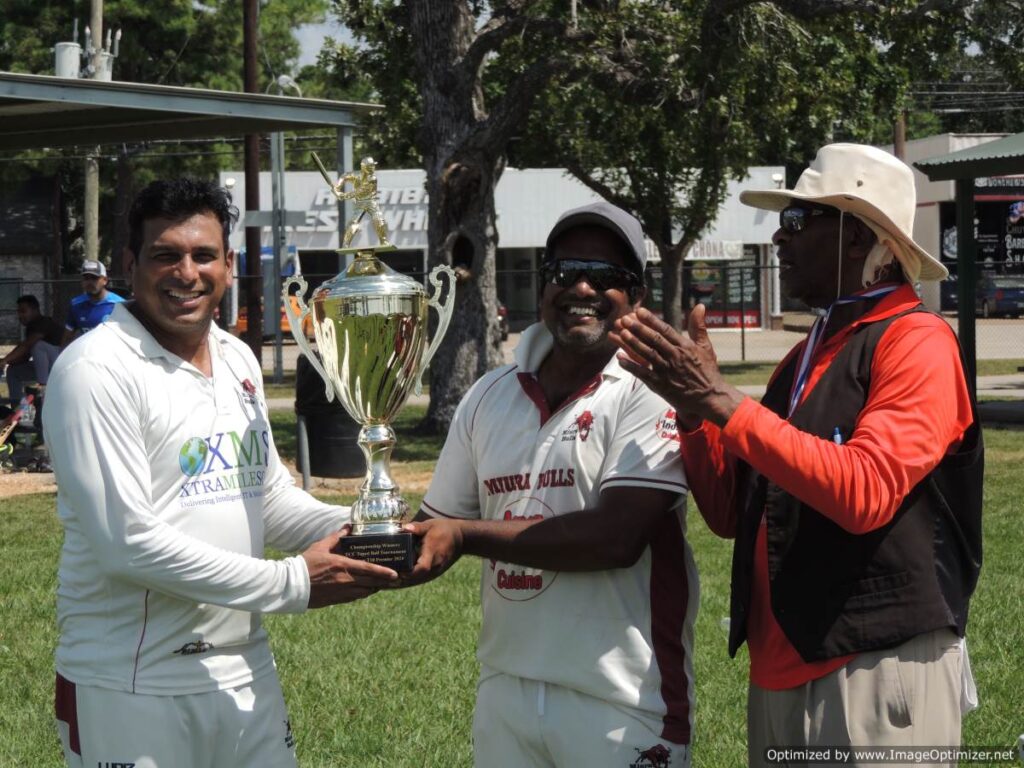 Bulls Team Management with the Championship Trophy