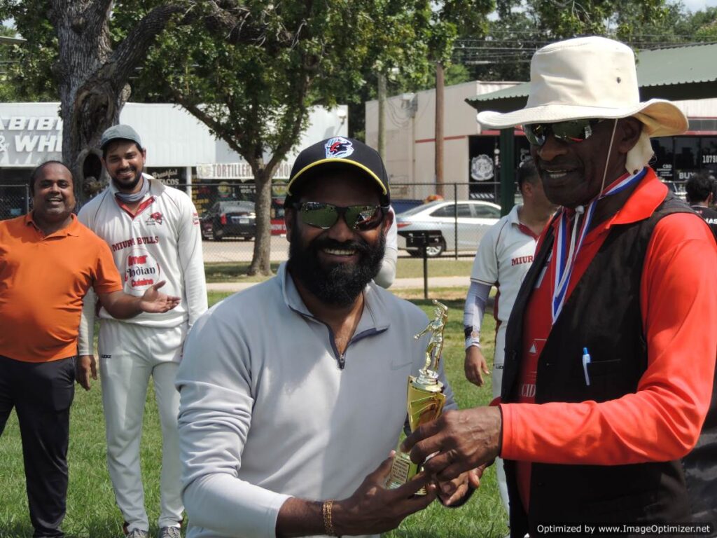 Srinivasarao Kandubothula from Bulls with special trophy for Hattrick